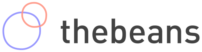 graphic logo of The Beans in pink, purple, and black.